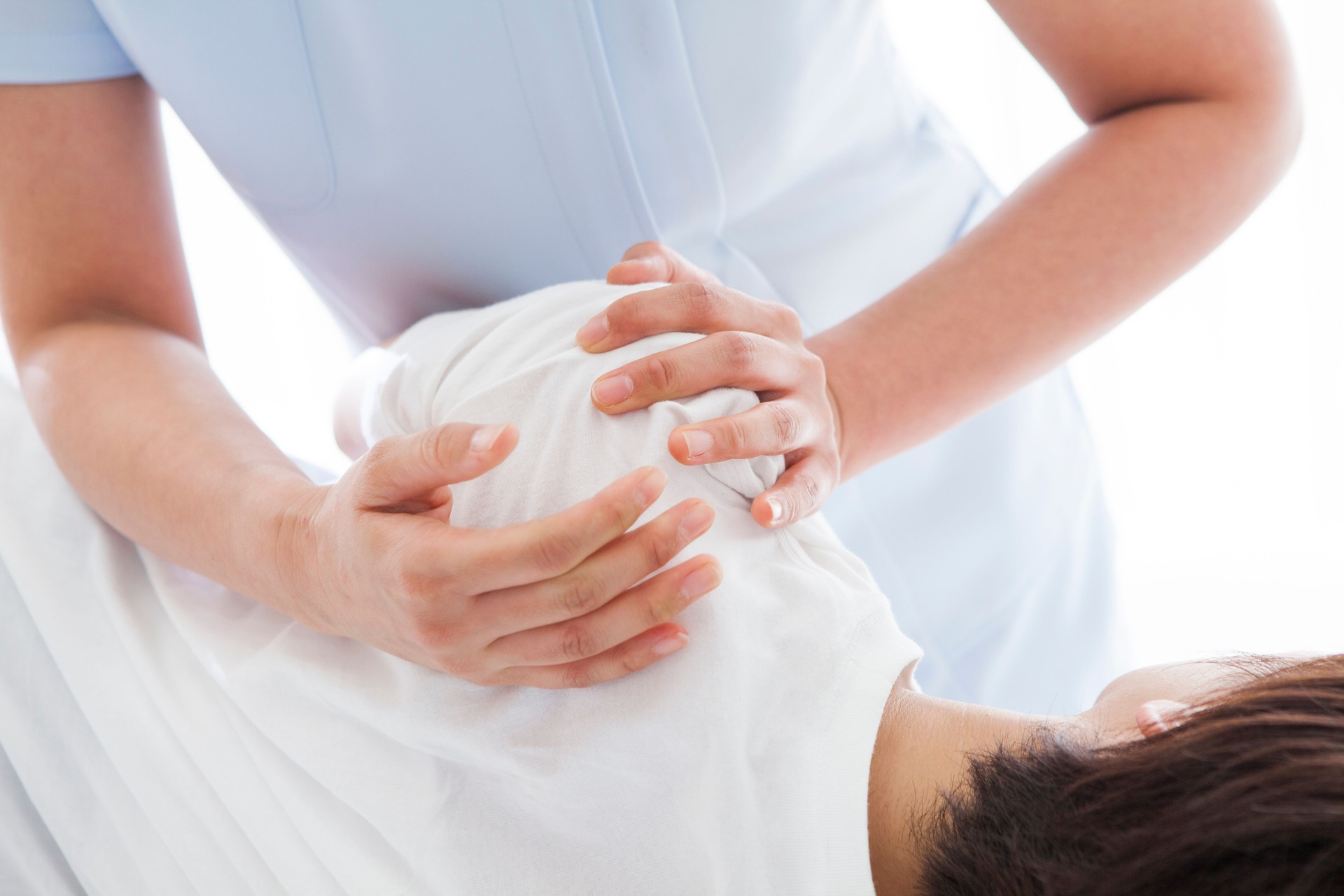 Young woman at the center of arm are receiving massage